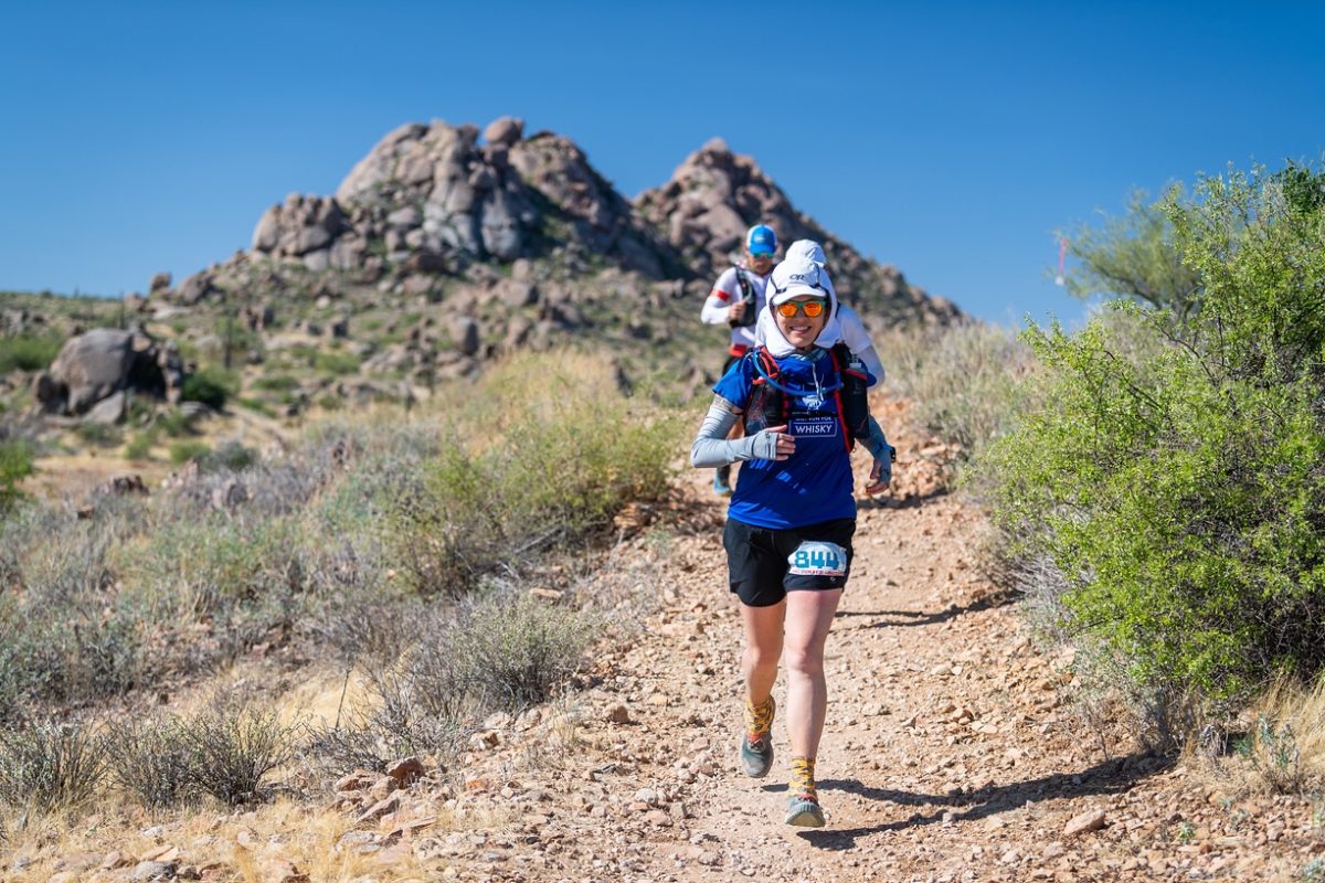 Runner on desert trail